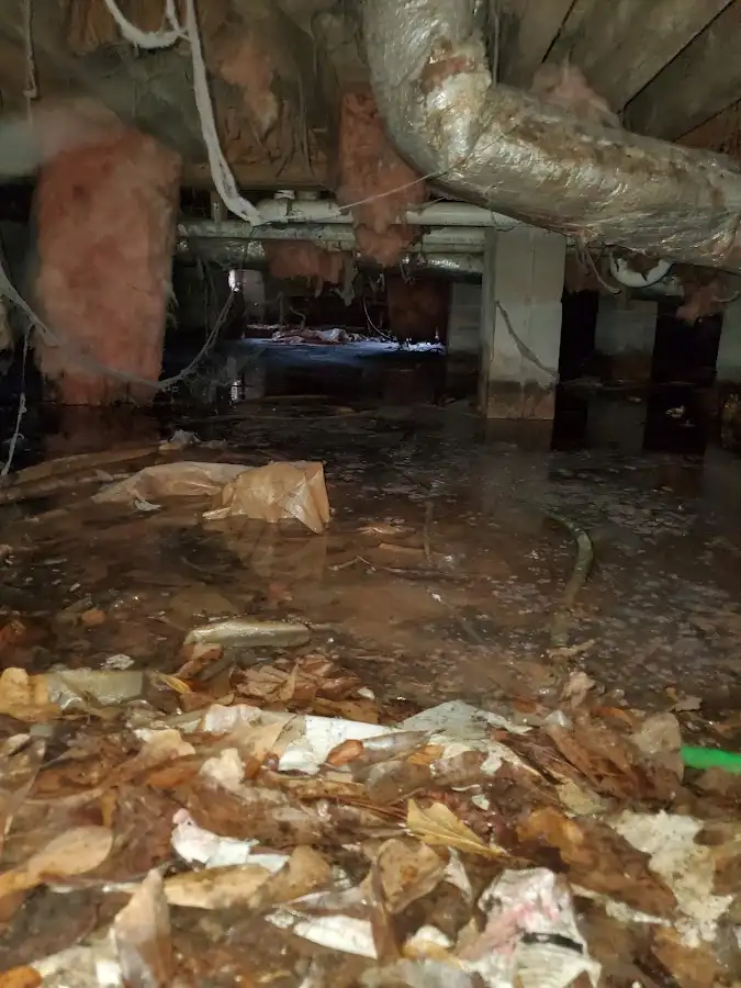 Crawl space flood assessment for Commercial Water Damage Restoration in Claiborne